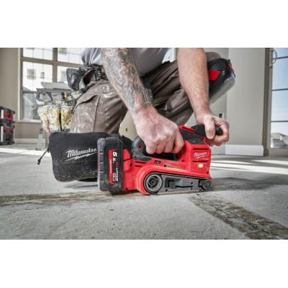 M18 FBTS75-552X - Szlifierka taśmowa 75 mm, 18 V, FUEL™, 5.5 Ah, w walizce, z 2 akumulatorami i ładowarką